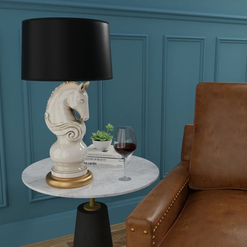 Ceramic Horse Table Lamp In Bay Blue Room Sitting Next to a Beige leather chair  