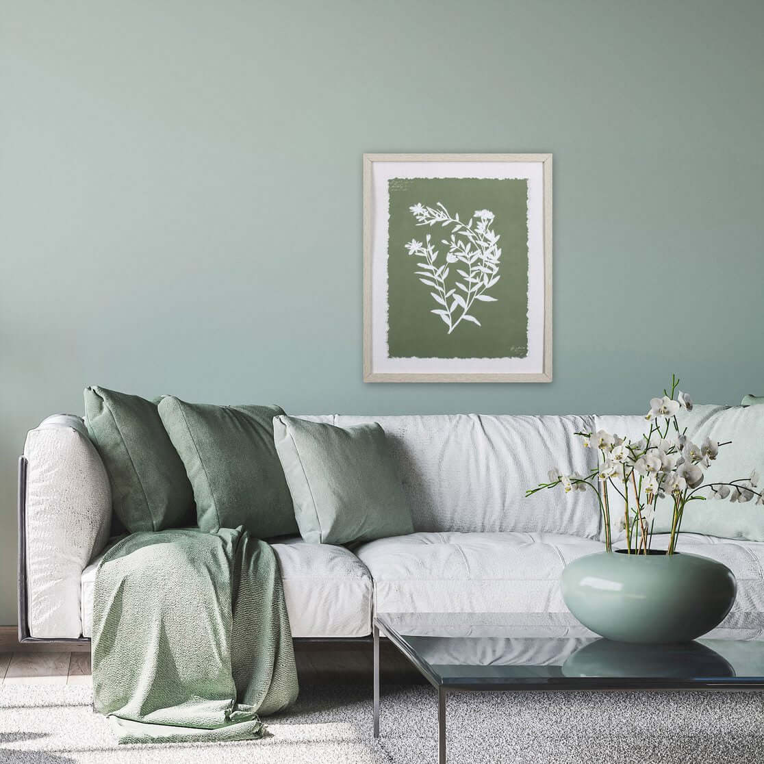 Sofa with Sage Pillows and Wall Art
