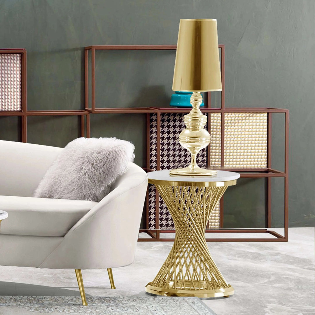 Spiral Gold Rod End Table wWith White MArble Top next to grey sofa in living room with dark green walls